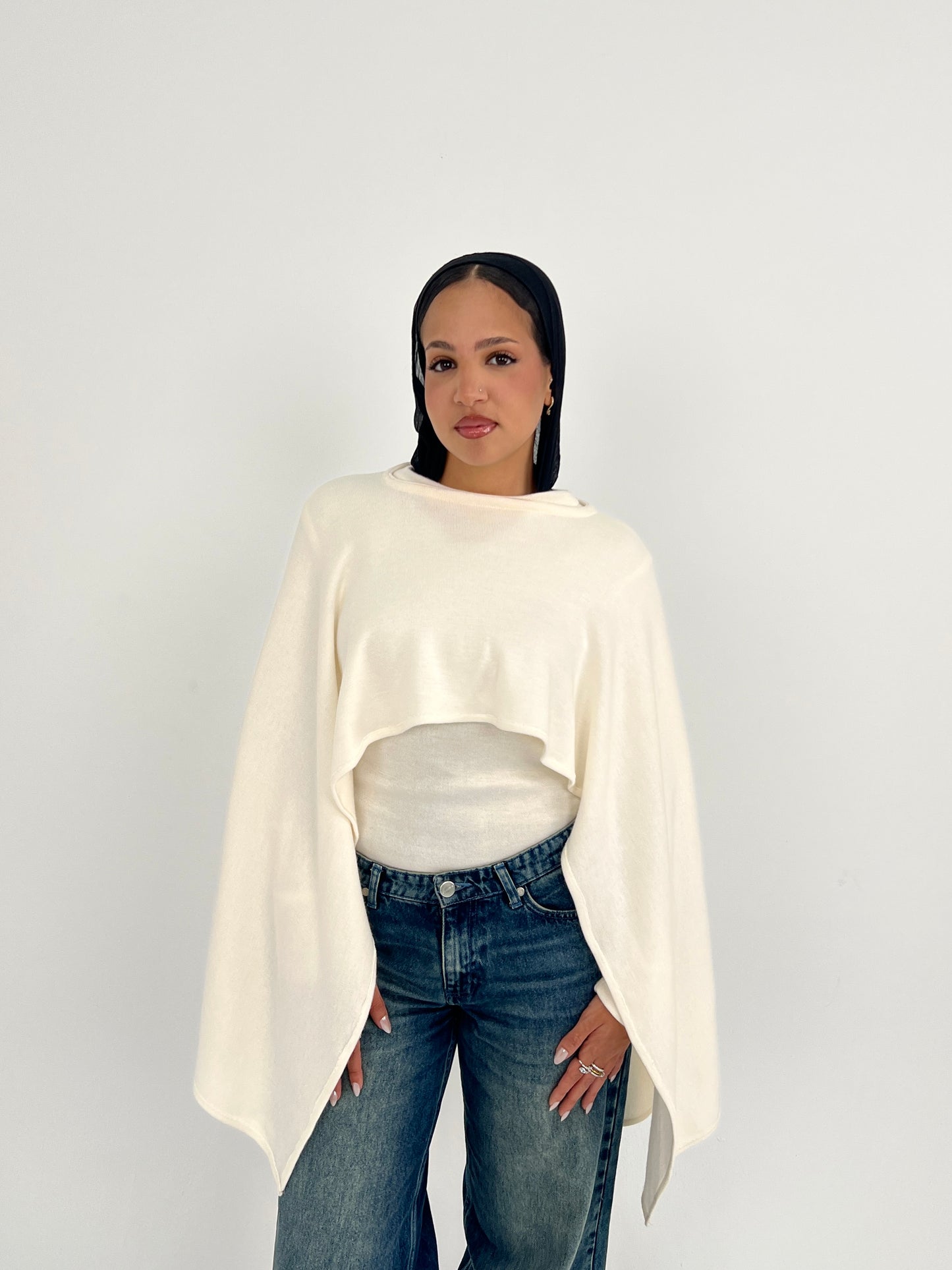 The knitted cape top